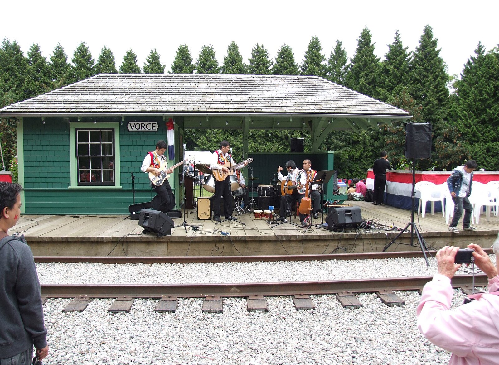 Band performing at Vorce station, Burnaby Village Museum