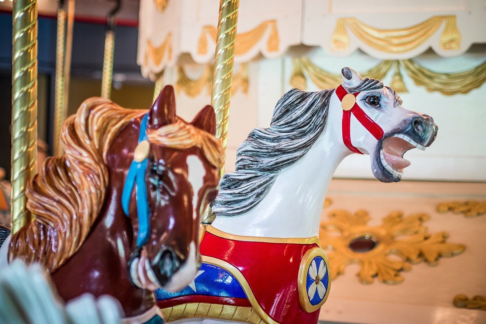 Hand-carved carousel horses (location not confirmed)