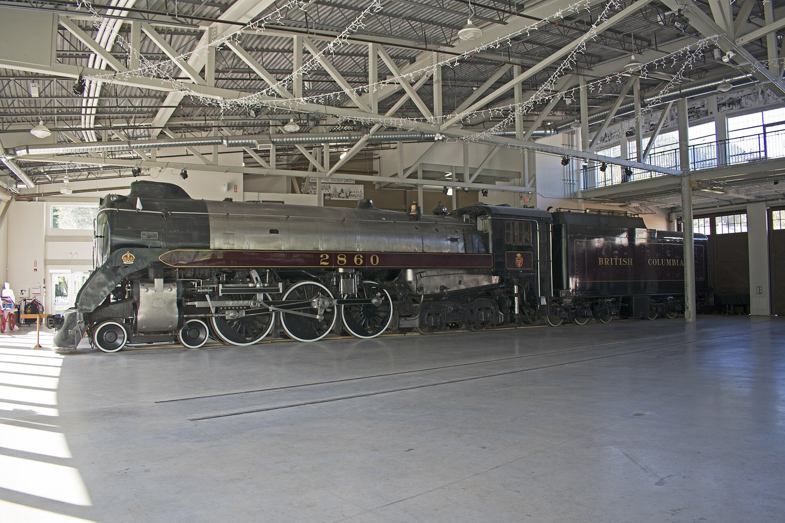 Royal Hudson 2860 steam locomotive inside Squamish railway museum hall